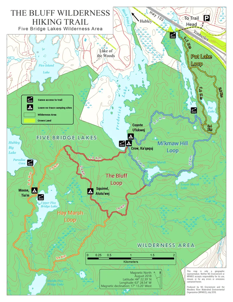 Official topographic map of The Bluff Wilderness Hiking Trail showing the four colour-coded loops, lakes, camping sites, and canoe access points.